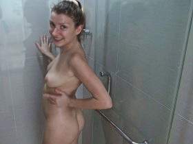 Polite girl pee in the shower