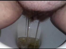 Molly Star: pissing on the toilet