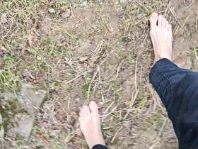 Walking barefoot in the garden and showing my dirty soles