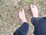 Walking barefoot in the garden and showing my dirty soles