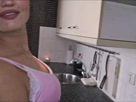 Teen cooks for her lover u gets fucked in the kitchen while cooking.