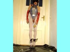 Caviar and *******ne in a silver lycra body and white pantyhose