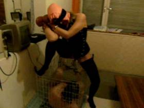 Bound slave girl pisses on slave cage