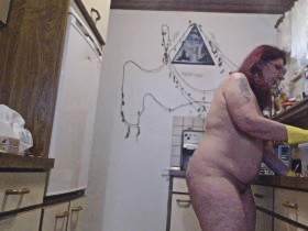 Naked while washing dishes
