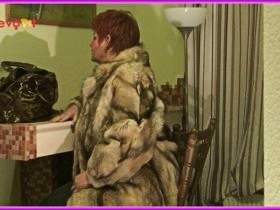 Masturbates in public in a fur coat