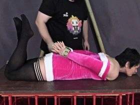 Christmas orgasm in the hogtie