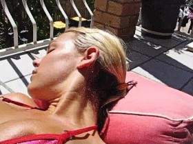 Perfect Body. Sunbathing on the balcony