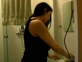 Angela Diabolo shave in the shower and masturbates with a razor.