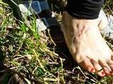 My feet in the dry grass