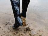 Rubber boots by the lake
