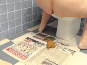 Shitting and Pissing on the Newspaper