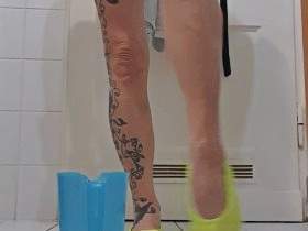 In slippers over  'n measuring cup