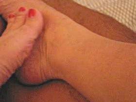 Footjob with her bare feet until cumshot