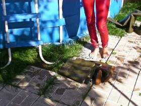 Nikki in Waders and red Slinkystylez Leggins in a pool