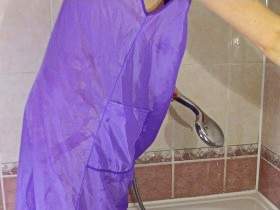 Christina in smock with custard and nude shower scene