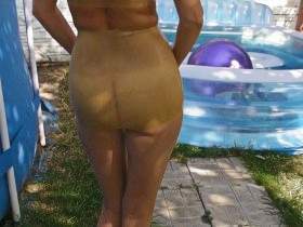 In transparent latex and waders in the pool