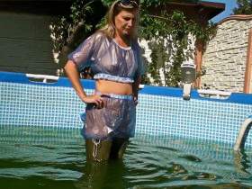 In Waders and blue PVC Outfit