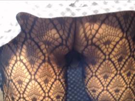 Butt in fishnet tights