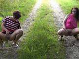 2 Girls peeing in the forest