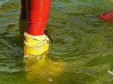 Yellow rubber boots and red rubber leggings