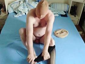 Hot Nylon Encasement in Black Pantyhose