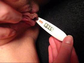 Thermometer in pussy full of sperm