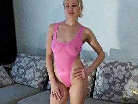 Christina posing in pink see thru leotard