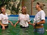 3 Girls in Jeans and T-Shirts in a pool