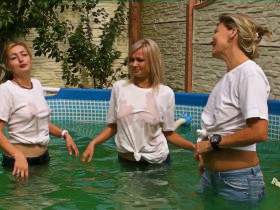 3 Girls in Jeans and T-Shirts in a pool