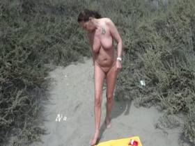 Pissing on the beach and blowjob