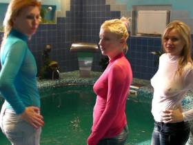 3 Girls in jeans ind nylon tops in the pool