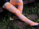 Orange fishnet stockings