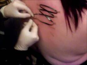 Corset Piercing - Needle session for the back