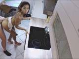 Horny girl is bareback fucked in the kitchen.