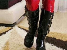 Christina posing in slinkystylez leggings and patent leather boots