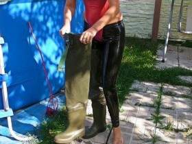 In rubber leggings and waders in the pool
