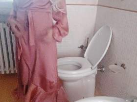 in the bathroom with silk dress