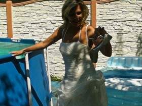 Show everything in wedding dress and sexy lingerie in the pool