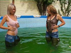 Christina and Nikki in jeans and waders in the pool