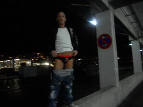 Peed in car parking on women
