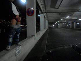 Peed in car parking on women
