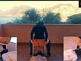 Italian toilet with lake view completely covered in shit