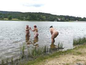 Two women, one man go bathing 2