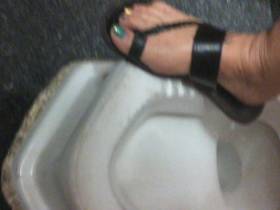 In Thailand piss on squat toilet