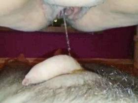 ***** pissing on cock