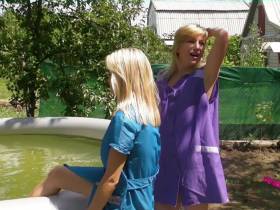 Alina and Christina in smocks in the outdoor pool