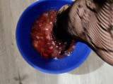 I crush rotten strawberries with my feet in fishnet tights