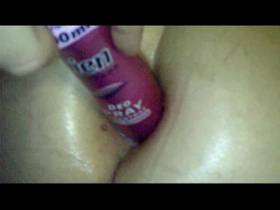Deo spray can in the ass