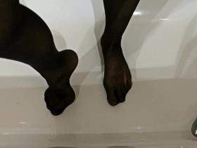 Showering in stockings and latex