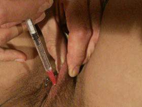 Syringe in the pussy